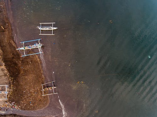 Free Aerial View of Outrigger Boats Moored at the Shore Stock Photo