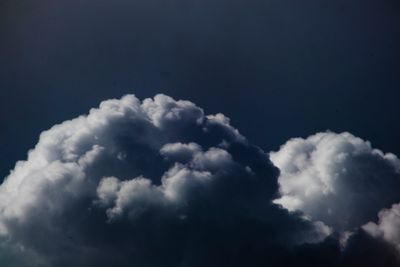 Deep blue rain clouds at dusk — photo by Nothing Ahead on Pexels