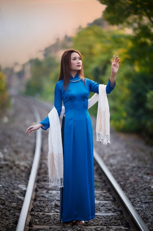 A Woman Wearing a Blue Dress on a Railway Free Stock Photo A Woman Wearing a Blue Dress on a Railway Free Stock Photo