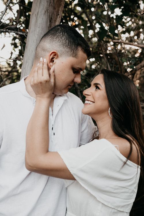 Free A loving couple shares a tender moment in a natural setting, symbolizing togetherness. Stock Photo