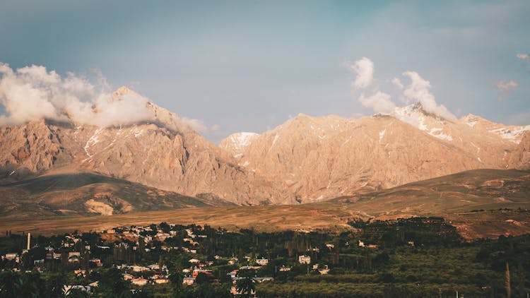 Houses On Lowland Near Mountains