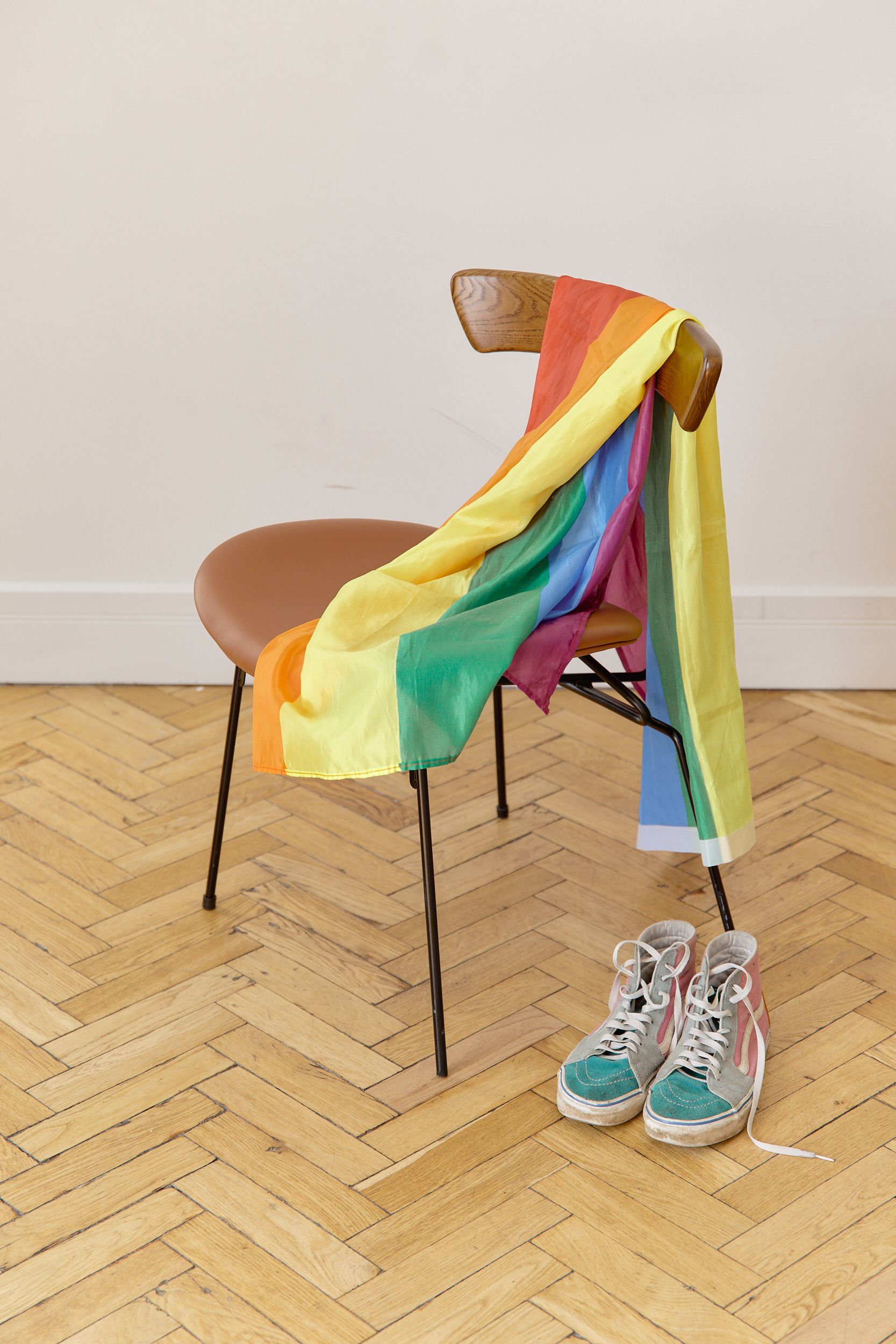 A Rainbow Flag on a Chair · Free Stock Photo