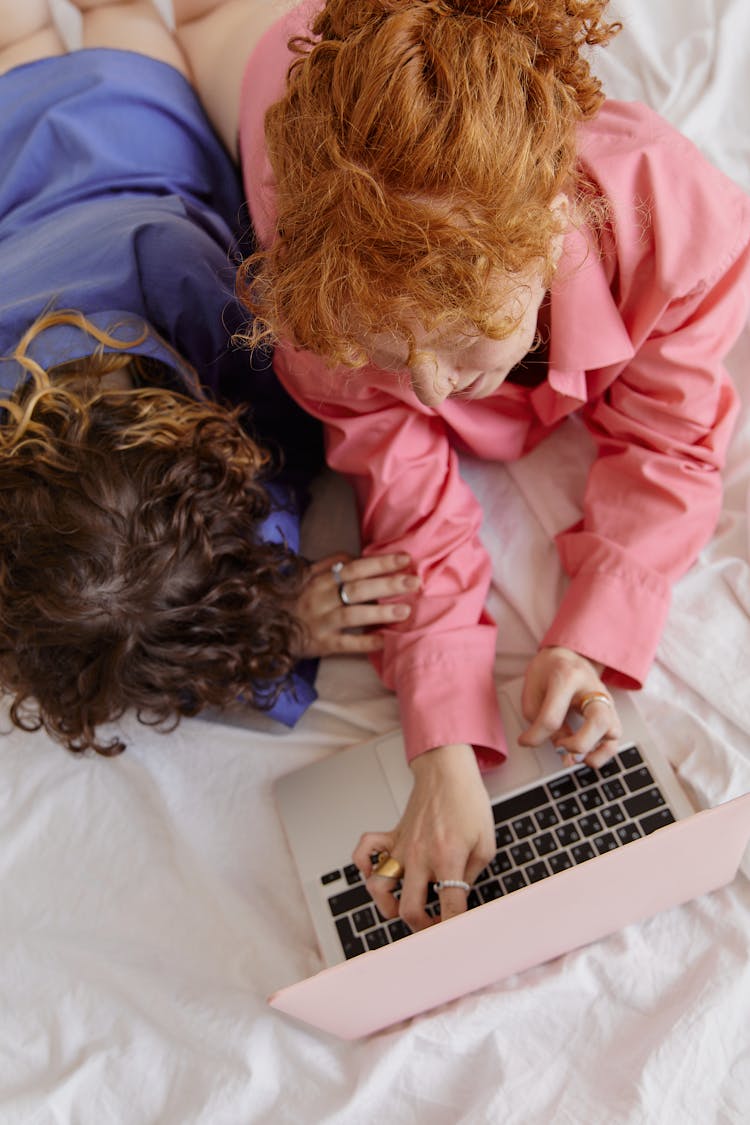 Couple Using Laptop