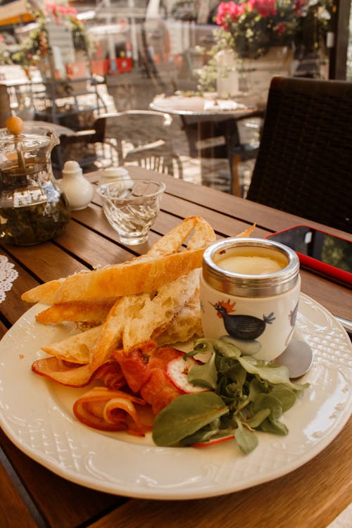 Dish with Bread Served in a Restaurant 