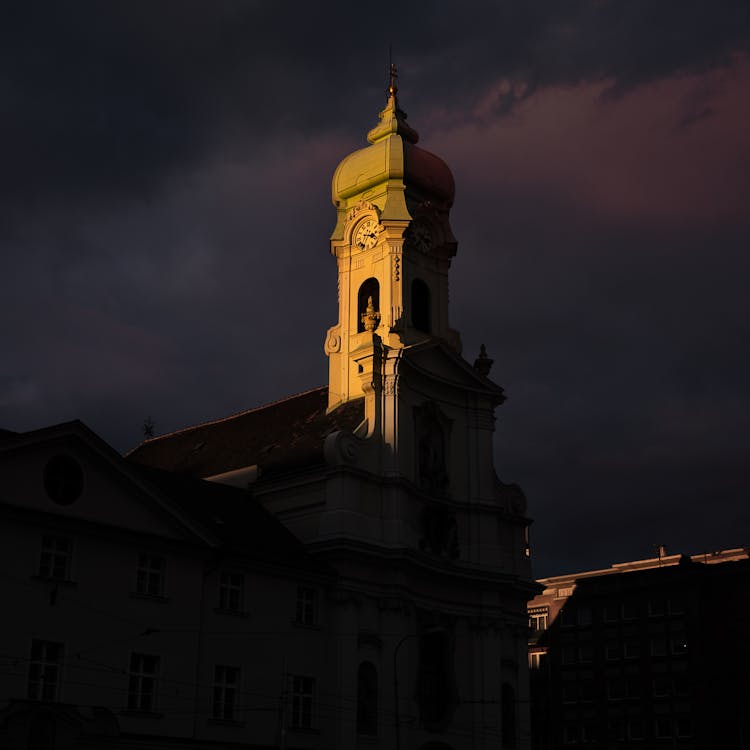 A Church Tower At Dusk