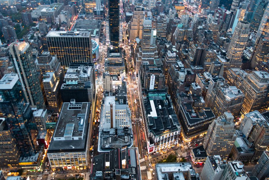 Breathtaking aerial view of New York City's busy streets and iconic skyscrapers.