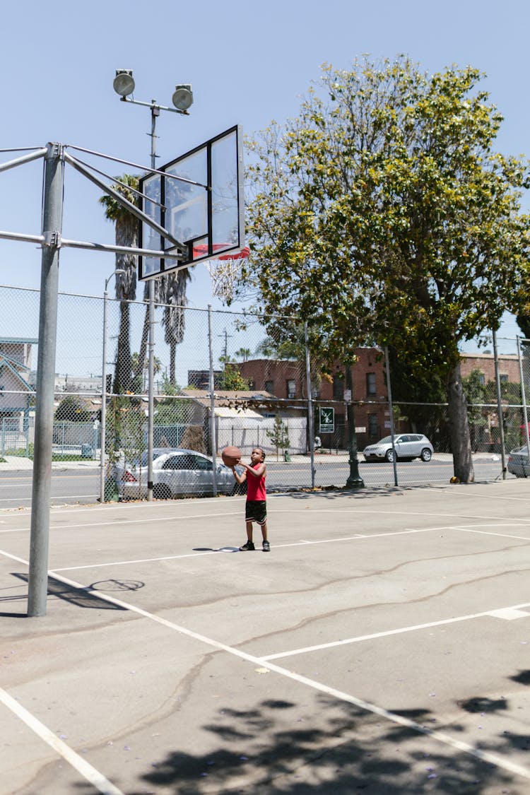 Boy Playing Basketball 