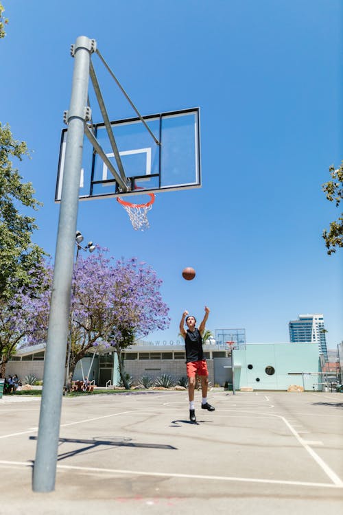 Kid Shooting a Basketball