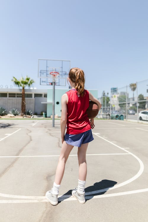 Young Woman Holding Basketball
