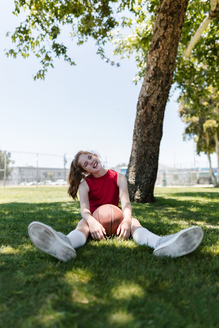 Photo Of Girl Holding A Ball