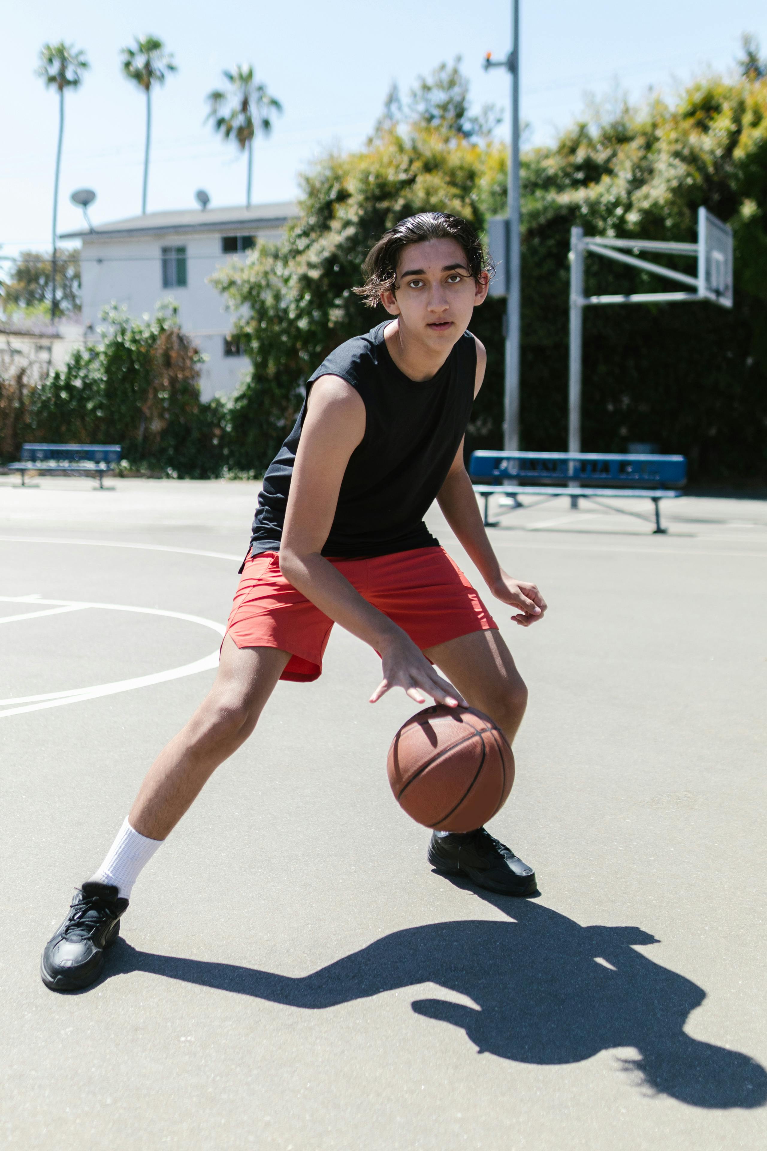 a boy playing basketball