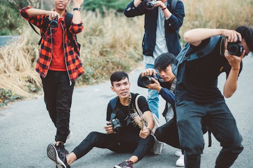 Foto stok gratis fotografer, grup, memotret