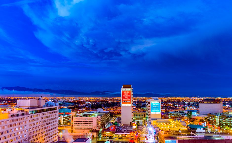 A stunning view of the illuminated Las Vegas skyline at night showcasing vibrant city lights.