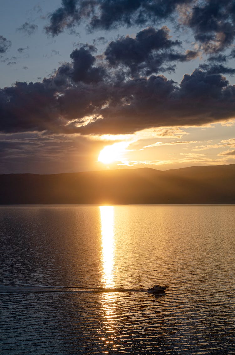 Speedboat On The Lake During Sunset