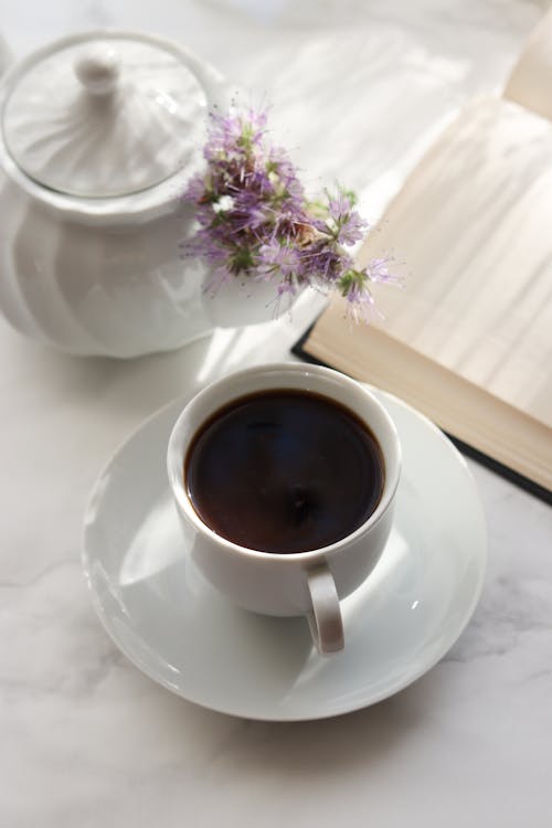 Free Cup of coffee and notebook Stock Photo