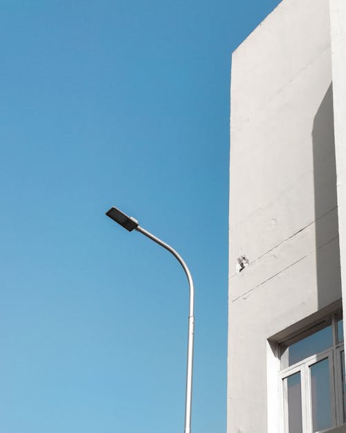 Photos gratuites de bâtiment, ciel bleu, contre-plongée