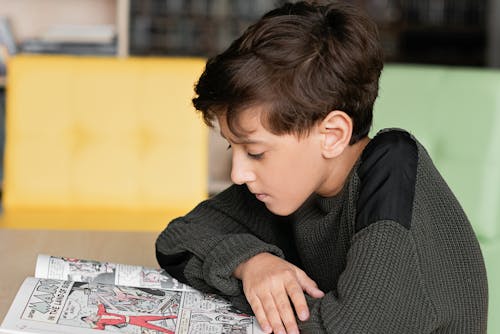 Boy Reading a Comic Book