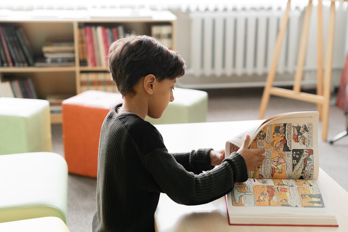 Person Holding Book · Free Stock Photo