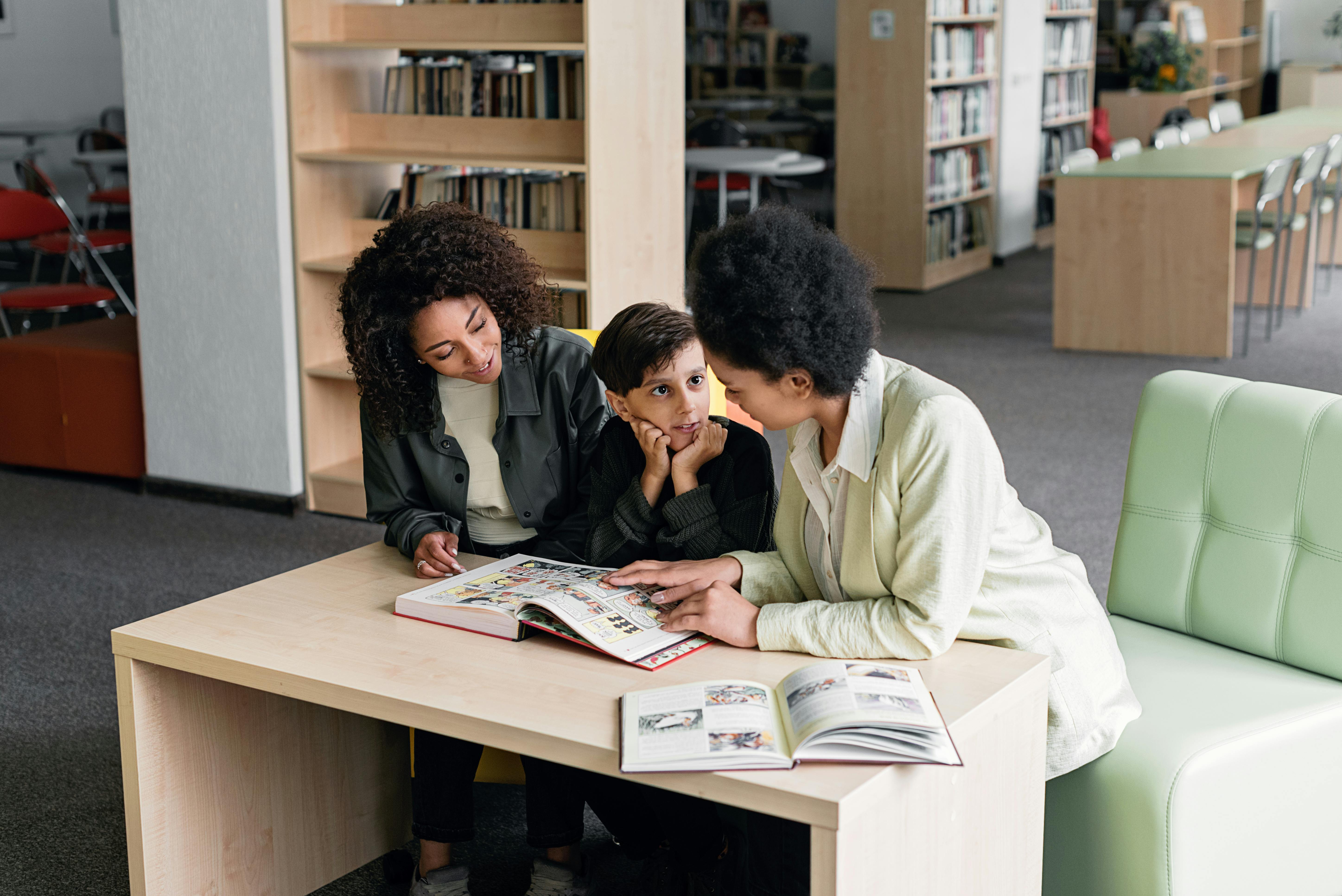 photo of women reading a book