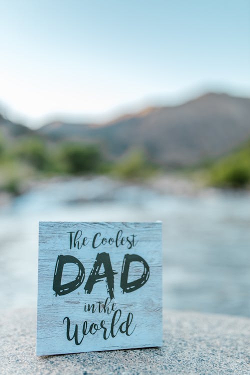 A Father's Day Gift  Made of Wooden Board with the Coolest Dad in the World Sign