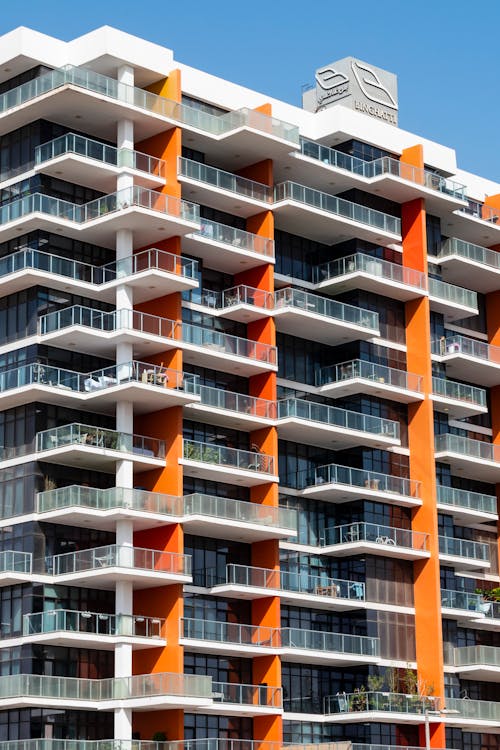 Free Orange and White Apartment Building Stock Photo