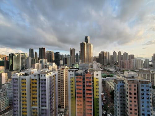 City Buildings Under Cloudy Sky