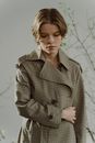 Woman in Brown Coat Standing