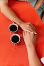 Person Holding White Ceramic Mug With Coffee