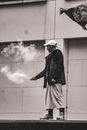Man in Black Jacket Smoking