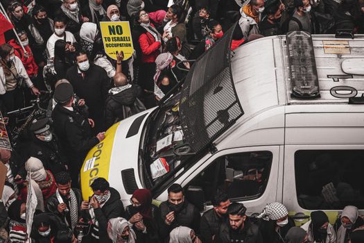 Police Car in the Crowd During a Protest 