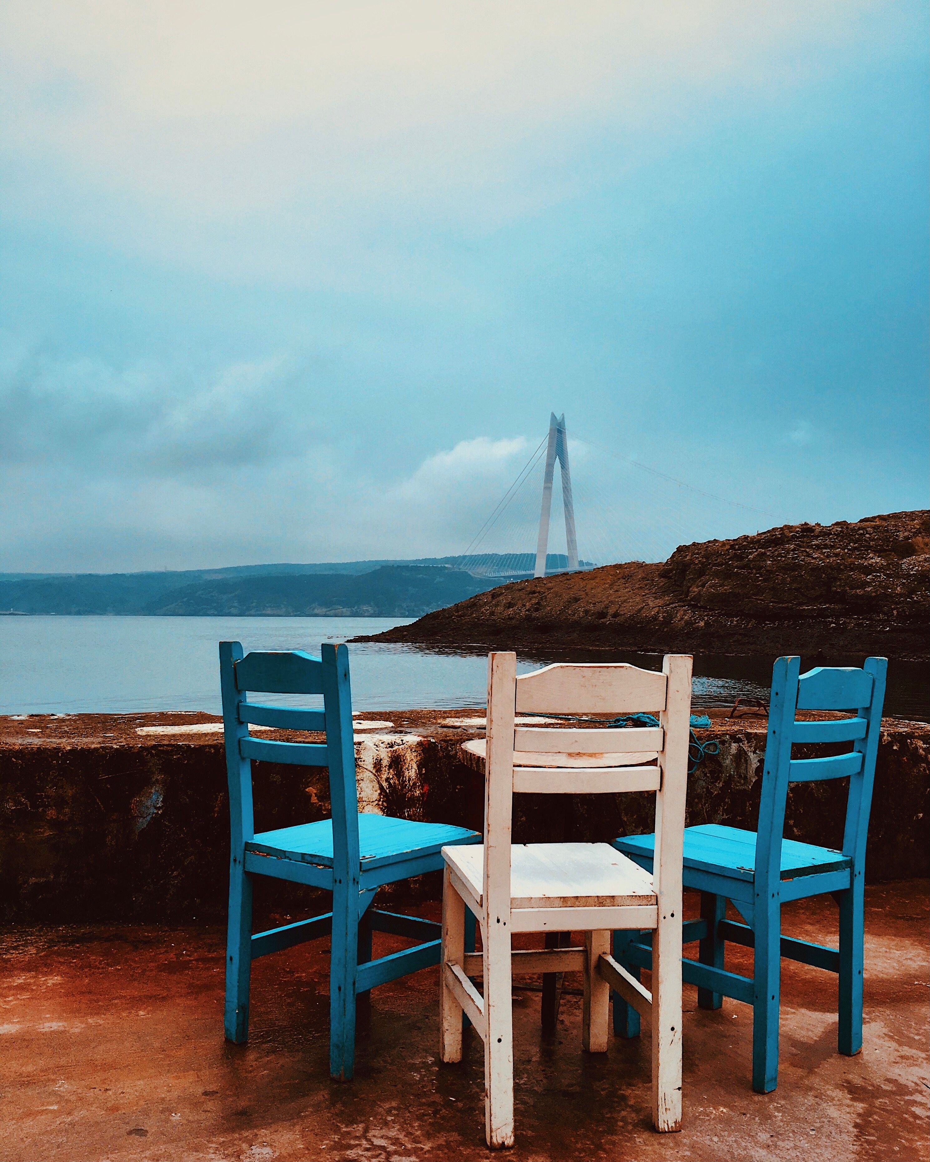 Blue and White Wooden Chairs near Body of Water · Free Stock Photo
