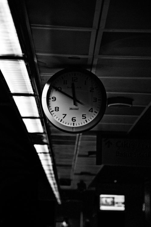 Grayscale Photo of Round Analog Wall Clock · Free Stock Photo