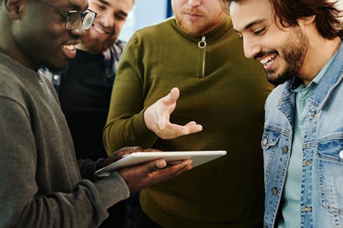 Free Group of Men having a Business Discussion  Stock Photo