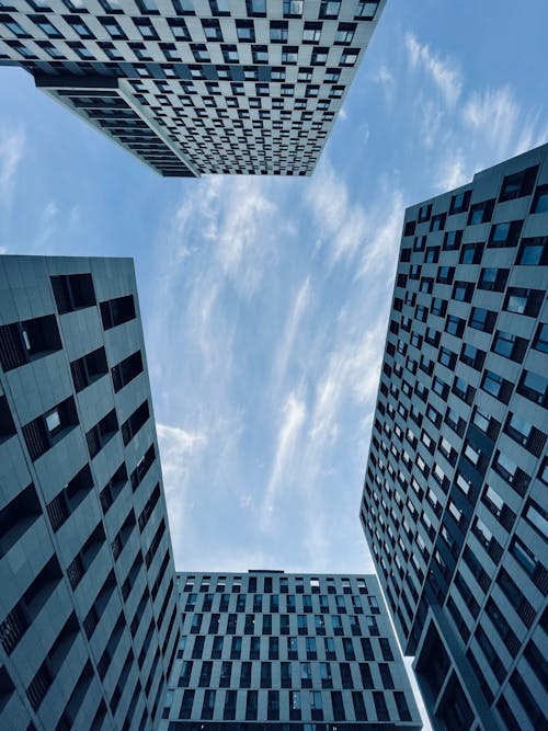Low Angle Photography of High Rise Building Under Blue Sky