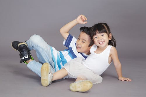 Free Boy and Girl Taking Picture Stock Photo