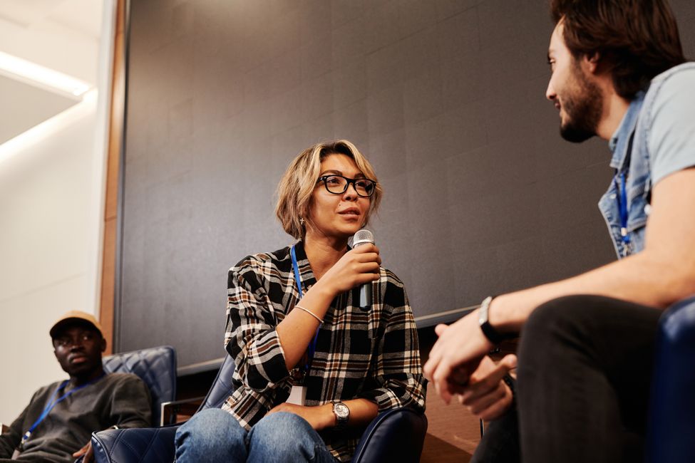 person speaking in conversation