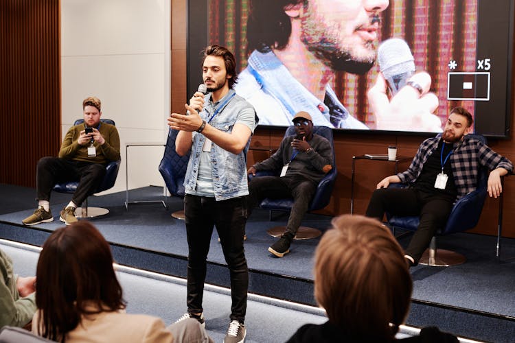 A Man Confident Talking Using Microphone