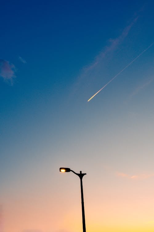 Free A Falling Star in a Clear Blur Sky Stock Photo