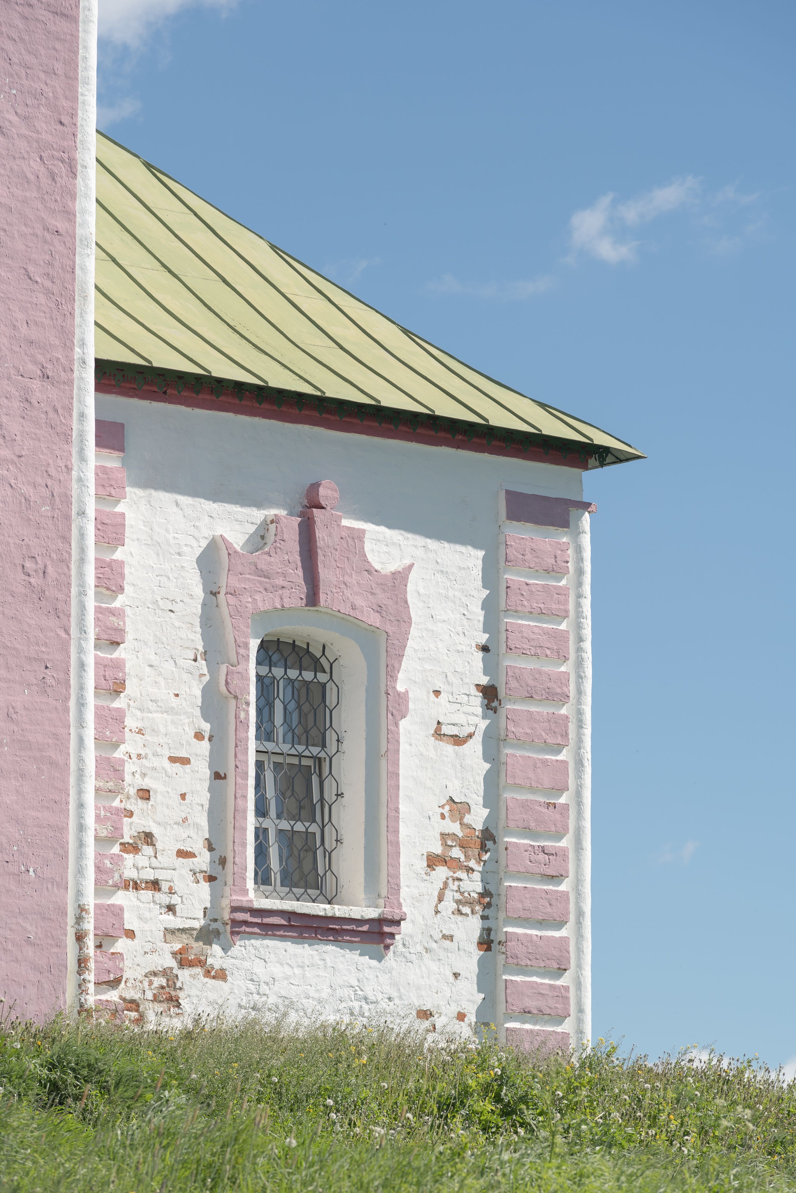 A Metal Frame Glass Window on a Brick Building · Free Stock Photo