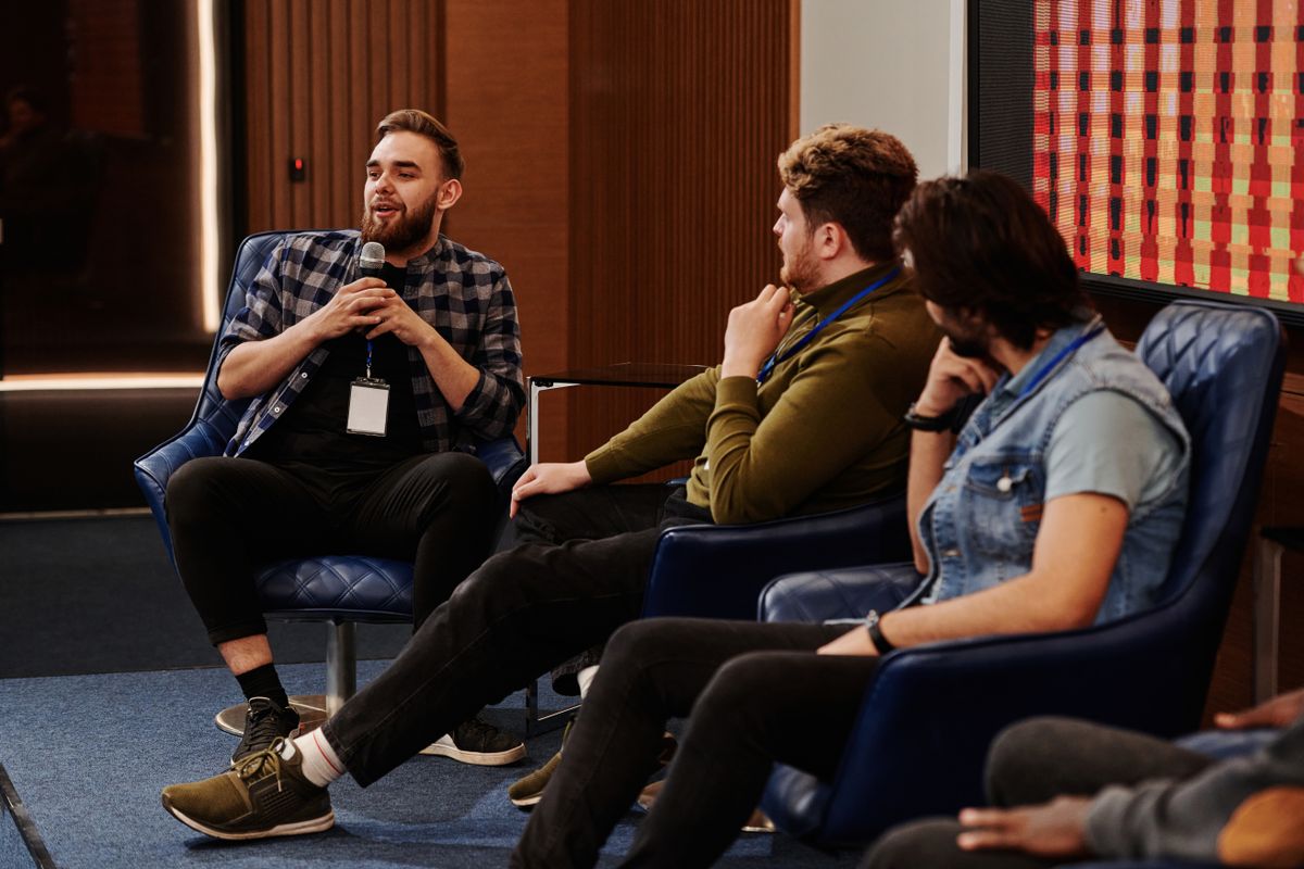 Panel discussion filmed in front of a live audience — photo by Henri Mathieu-Saint-Laurent on Pexels
