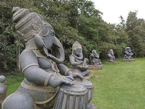 Elephant Statues on Green Grass