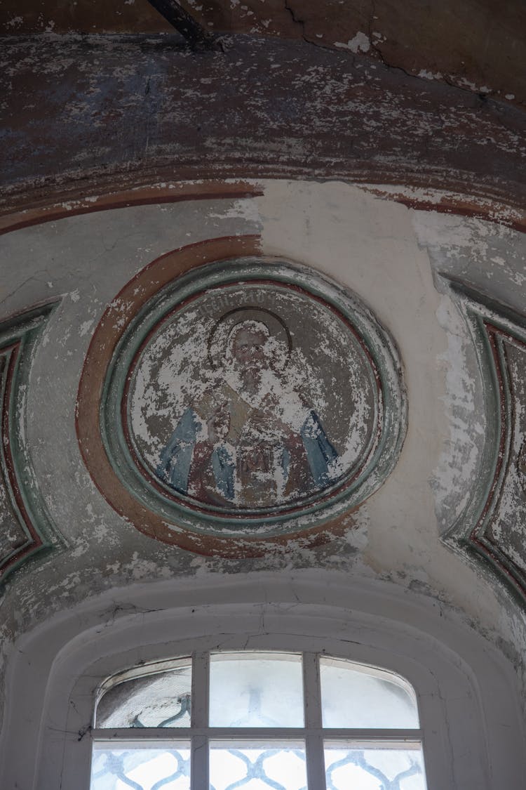 Weathered Fresco On A Ceiling 