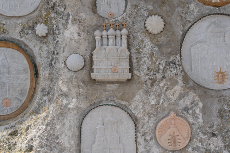 Marble Sculptures Mounted On A Wall