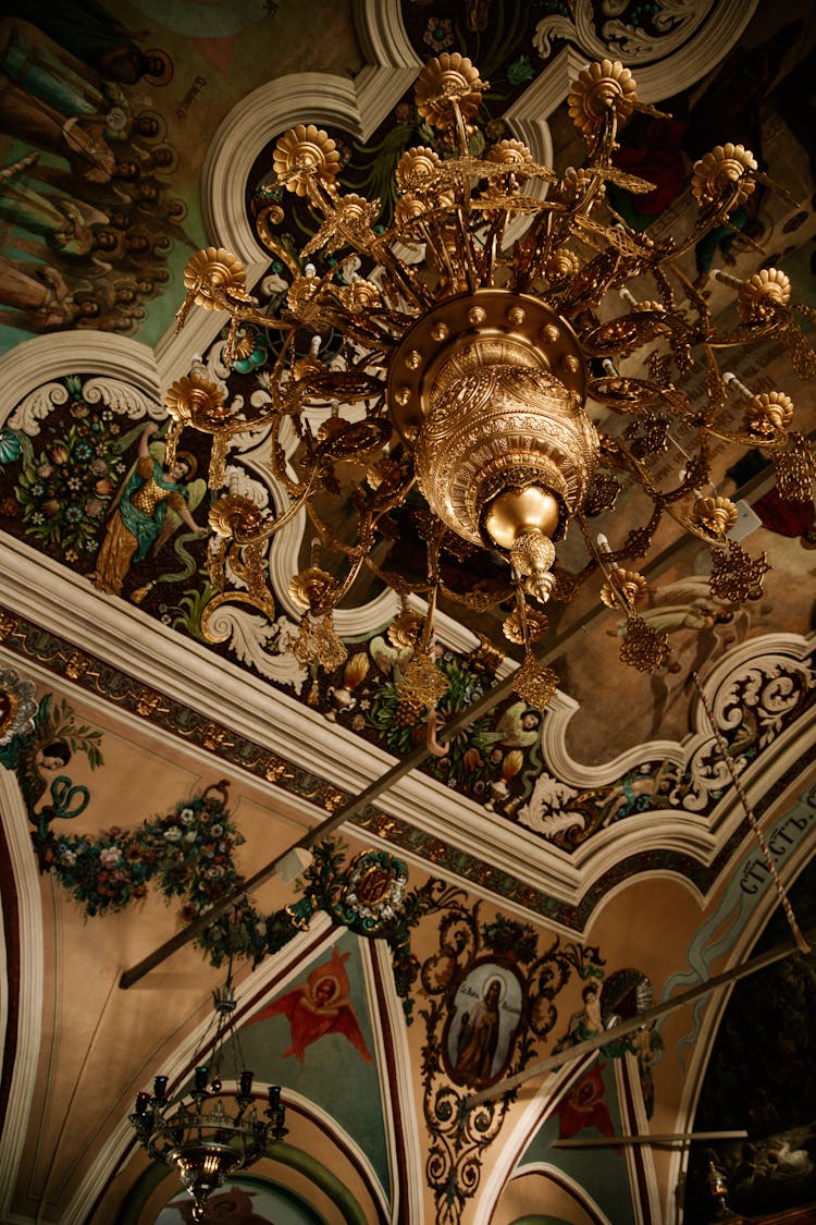 Golden Chandelier On Ceiling Of Church