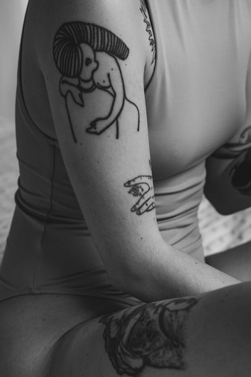 Free Woman with an Arm Tattoo Stock Photo