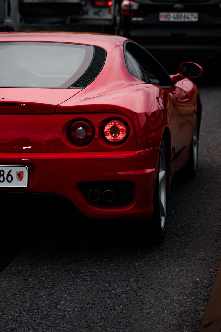 Red Ferrari On The Road 
