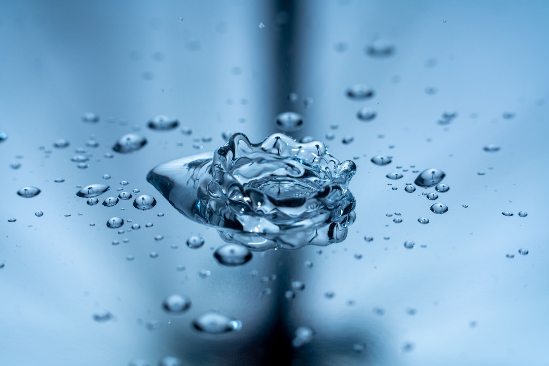 A mesmerizing macro photograph of water droplets illustrating motion and purity in a clear setting.. pexels, mesmerizing, mac