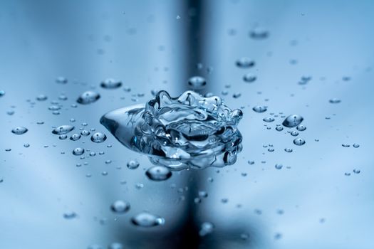 A mesmerizing macro photograph of water droplets illustrating motion and purity in a clear setting.. pexels, mesmerizing, mac