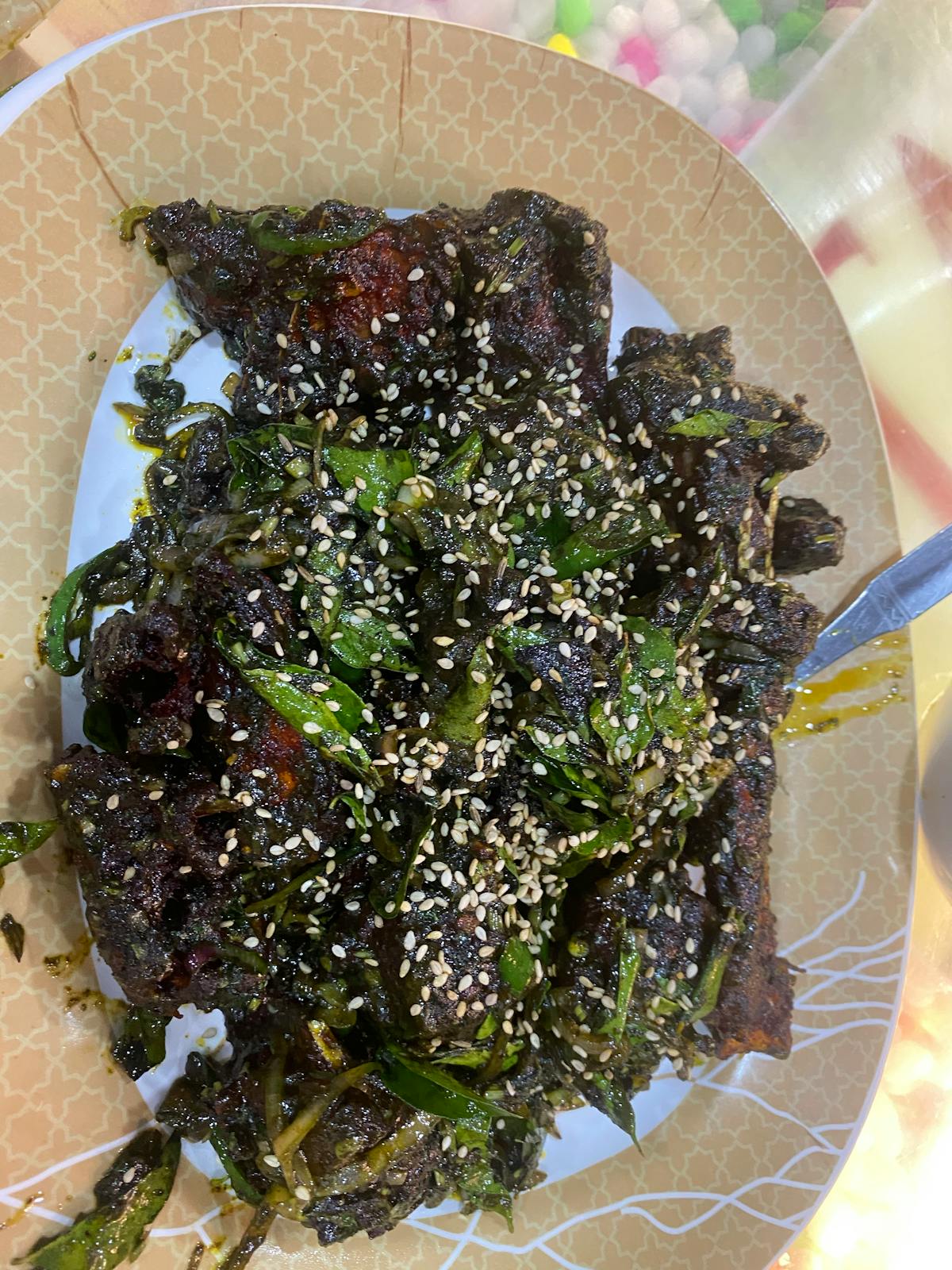 A vibrant bowl of kimchi brown rice with vegetables, egg, and sesame seeds
