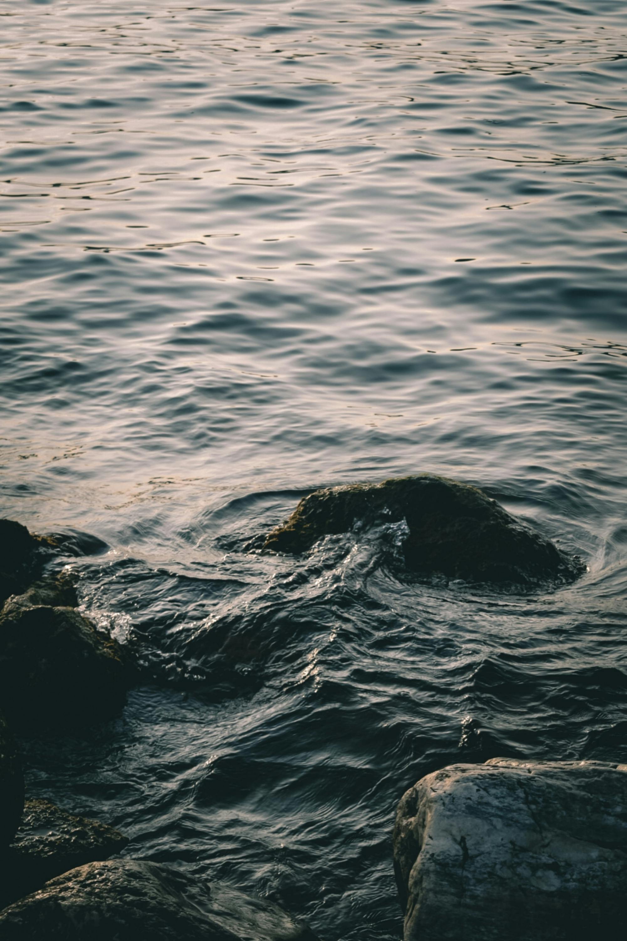 Free  Rocks on Body of Water Stock Photo